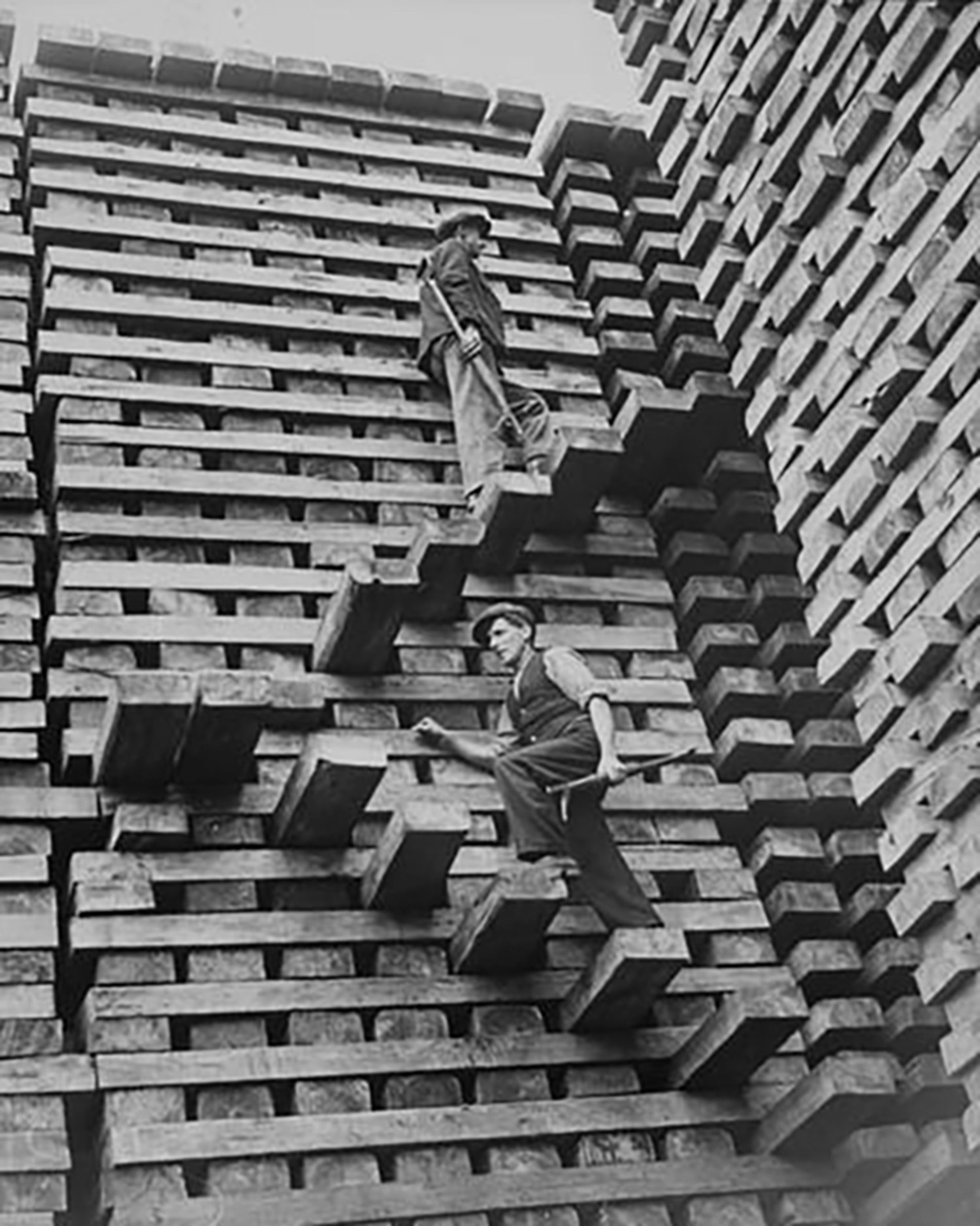 A Mountain of Railway Sleepers. Science Museum Group © Hulton Archive